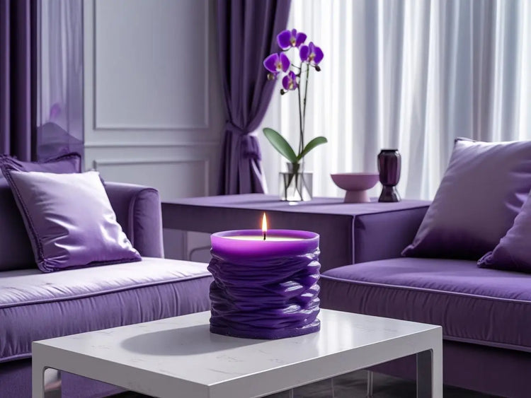 Luxurious purple sculptural candle on a modern coffee table in a regal living room setting, enhancing ambiance and elegance.
