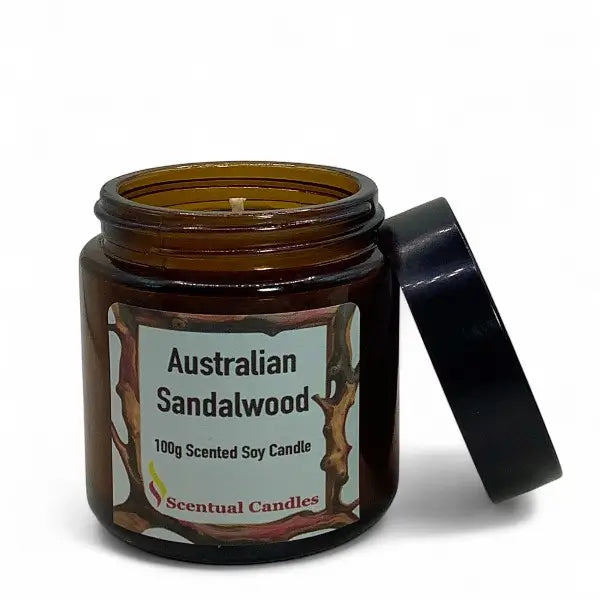 Scentual Candles Australian Sandalwood candle in a glass jar with a black lid on a white background