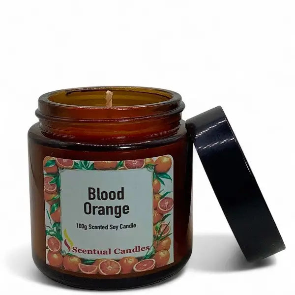 Brown candle jar with 'Blood Orange' label on a white background