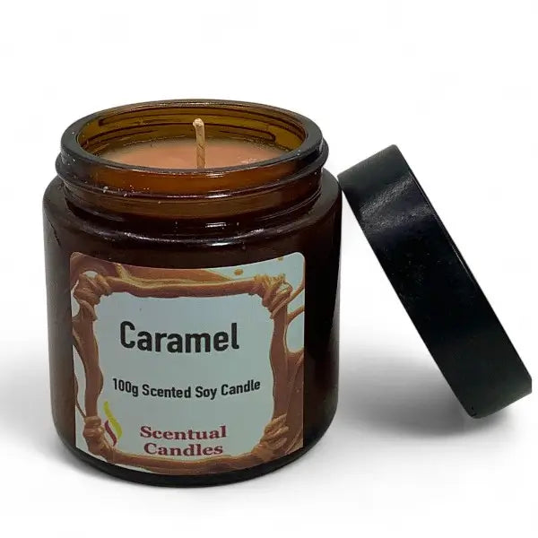 Caramel scented soy candle in a brown jar with a label on a white background