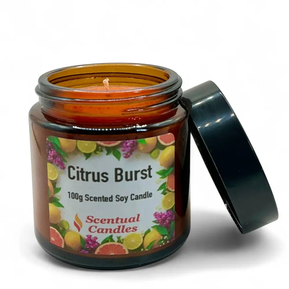 Scentual Candles Citrus Burst candle with label and lid open on a white background