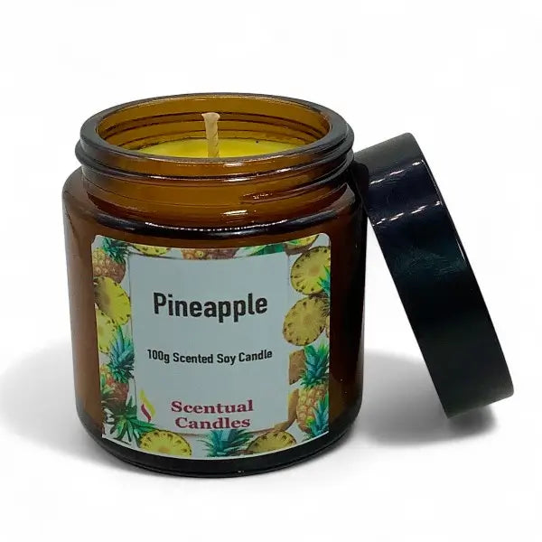 Scentual Candles pineapple scented candle in amber jar with black lid