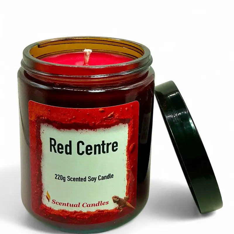 Scentual candles jar with a spicy vanilla red candle inside on a white background