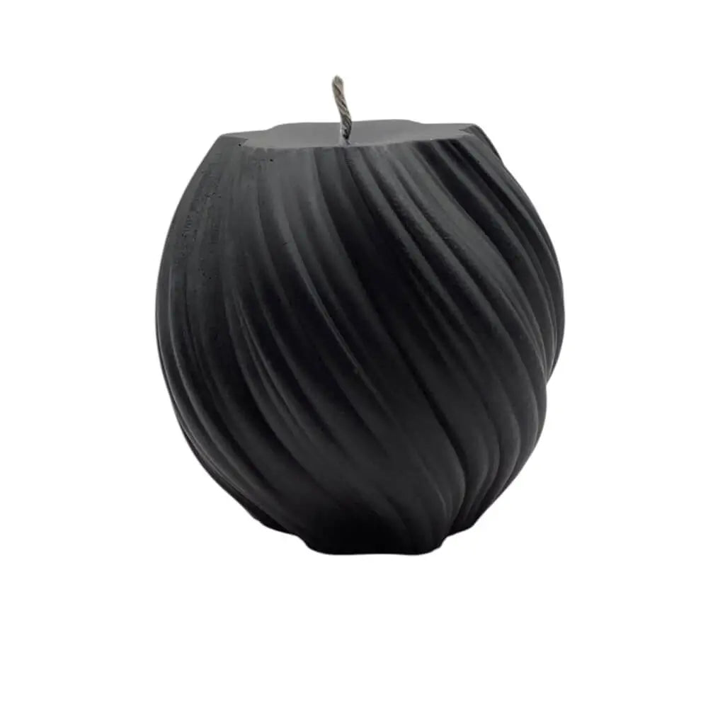 Black candle with wick on a white background