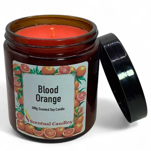 Scentual Candles Blood Orange candle in a brown jar with a label featuring blood oranges.