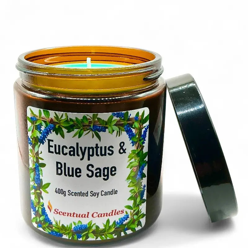 Eucalyptus candle in a jar with a label indicating Eucalyptus & Blue Sage fragrance on a white background.