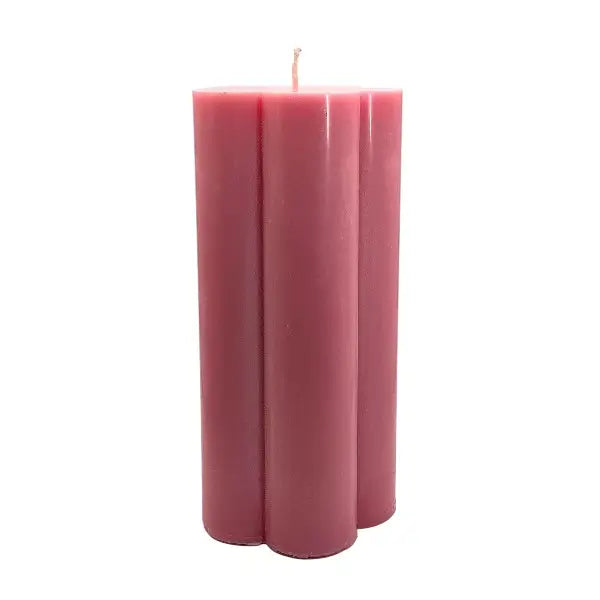 Flower shaped candle on a white background