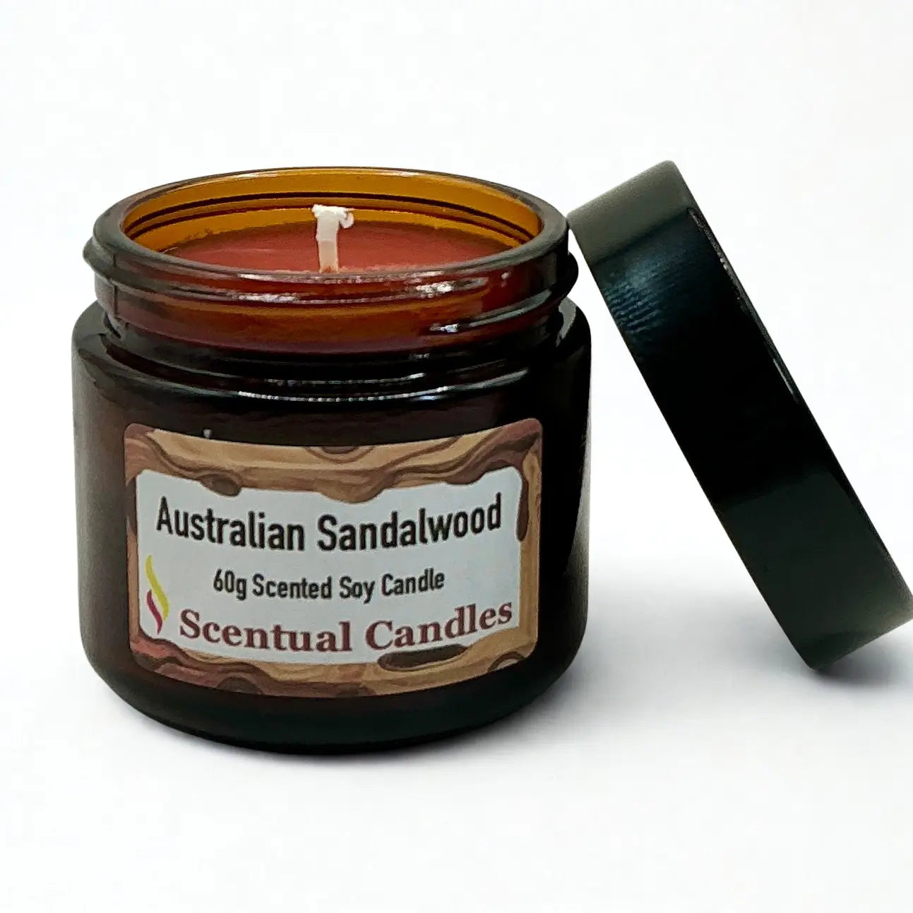 Scentual Candles Australian Sandalwood candle in a amber jar with black lid on a white background