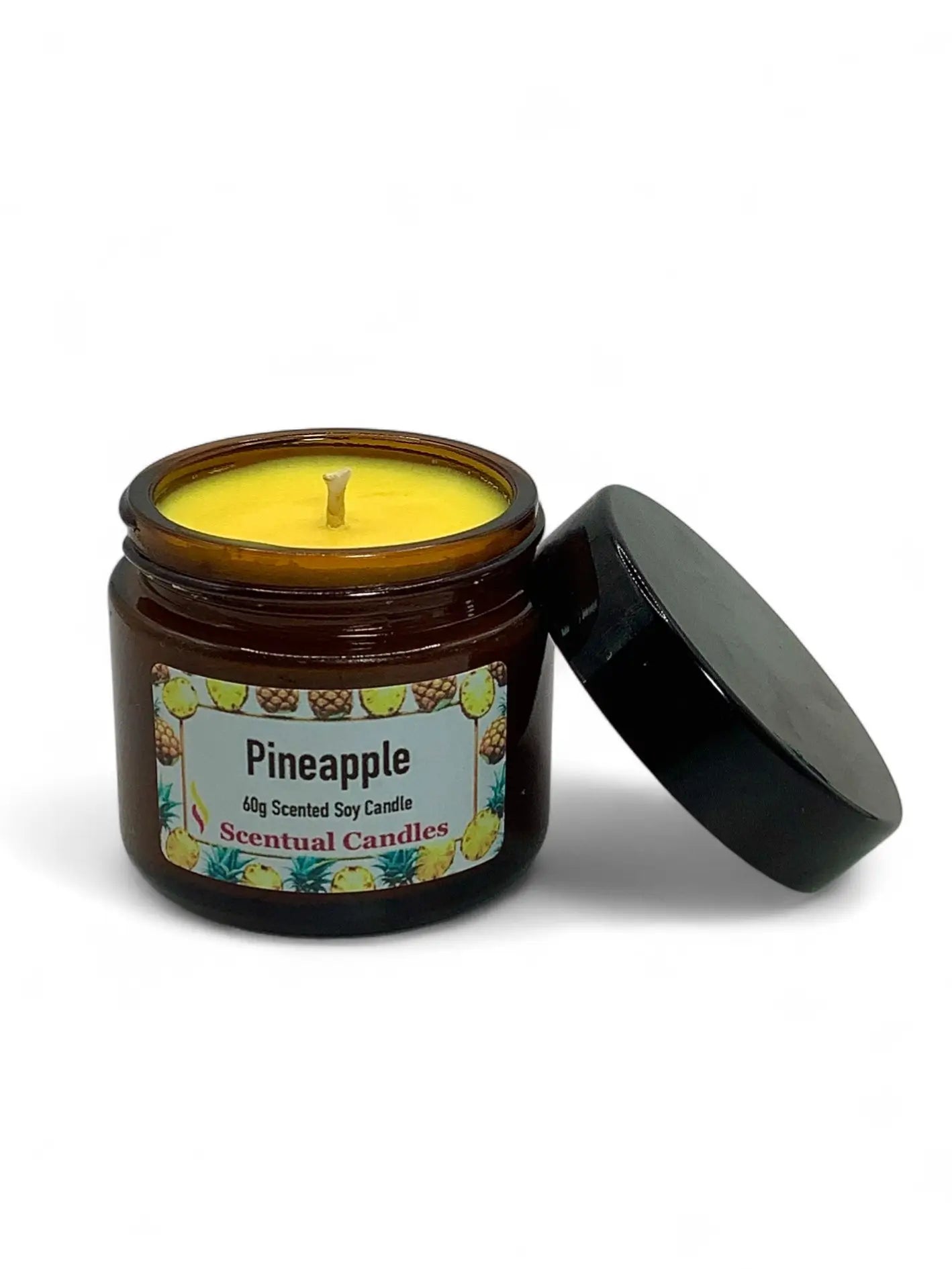Scented candle in a jar labeled 'Pineapple' with a black lid on a white background
