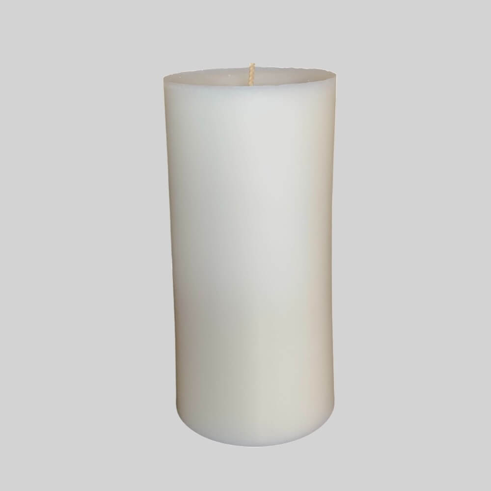 White candle on a light gray background