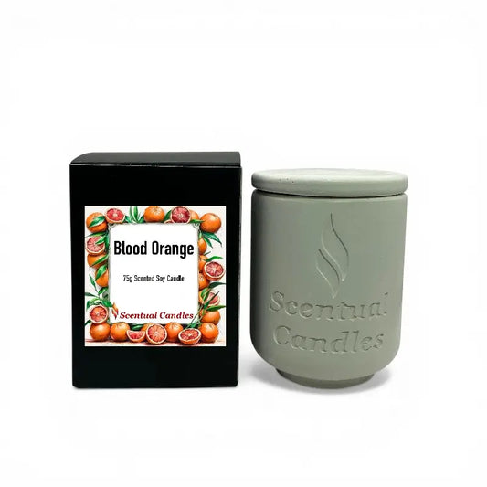 Blood Orange Candle in grey container with decorative box showcasing invigorating citrus scent.