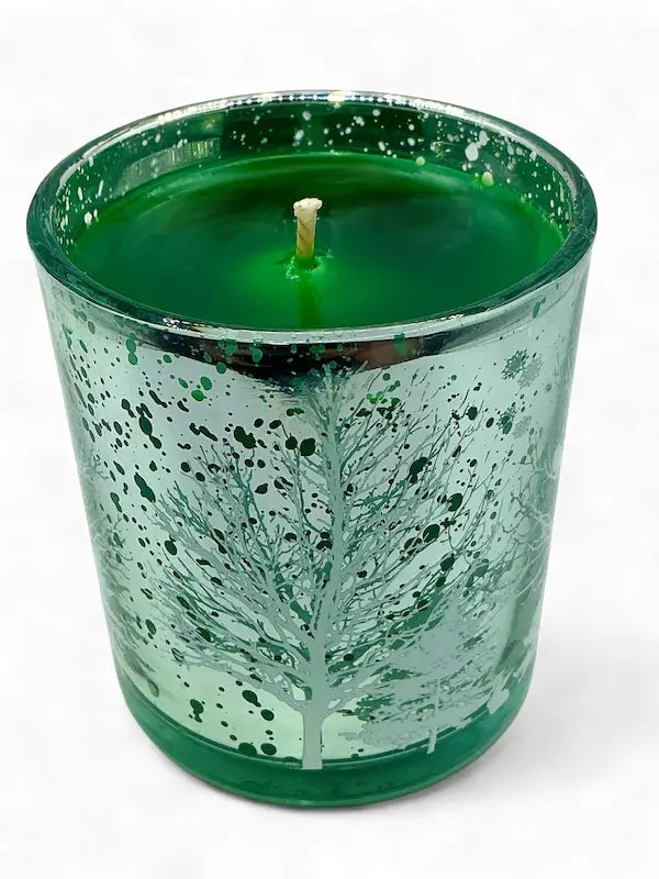 Christmas Candles in Decorative Glass with green wax and etched winter tree design, perfect for festive holiday ambiance and home decor.