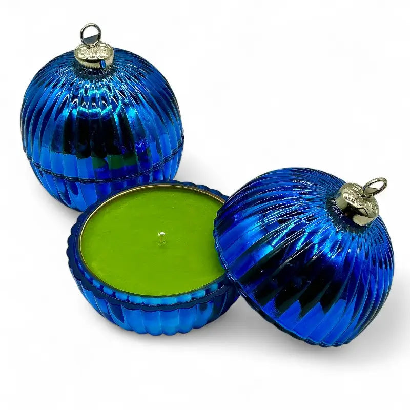 Glass Bauble Christmas Scented Candles, blue ribbed jars with gold tops, festive home decor.