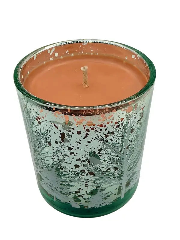 Christmas Candles in decorative glass with festive tree etchings.