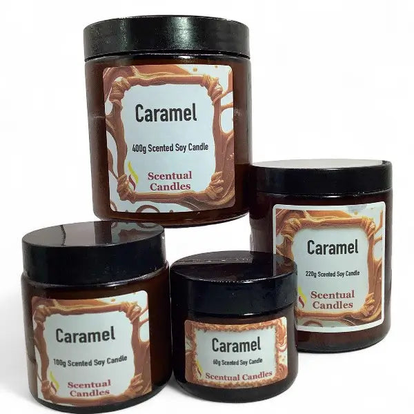 Four 'Caramel' scented soy candles from Scentual Candles on a white background