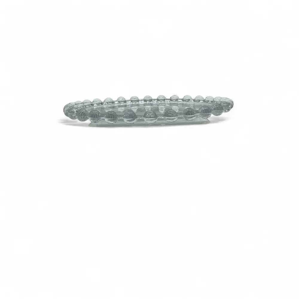 Clear glass decorative plate on a white background