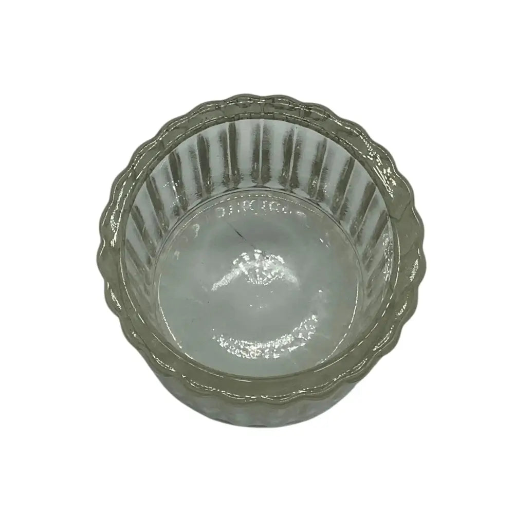 Clear glass candle holder on a white background
