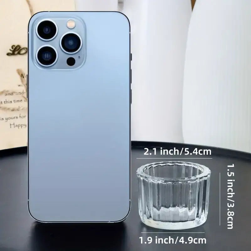 Glass Tealight Candle Hoders next to an iphone for size comparison