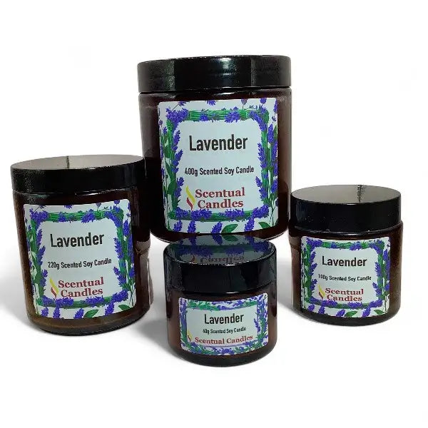 Four lavender scented candles with labels on a white background