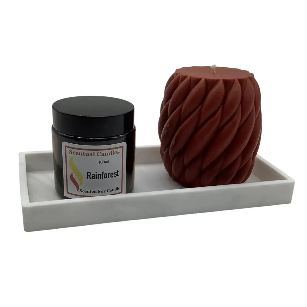 Scentual Candles Rainforest scented soy candle and jar on a white tray with a white background