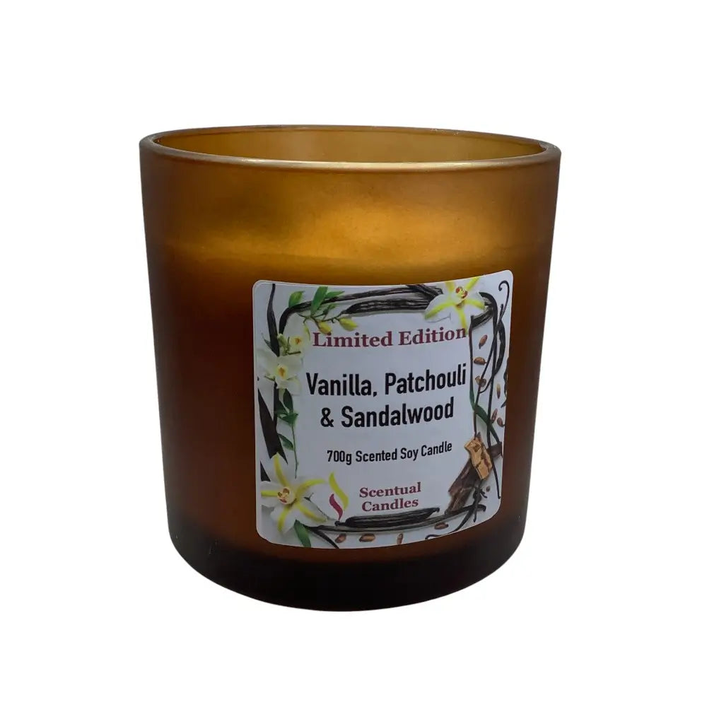 Amber glass candle with a label on a white background
