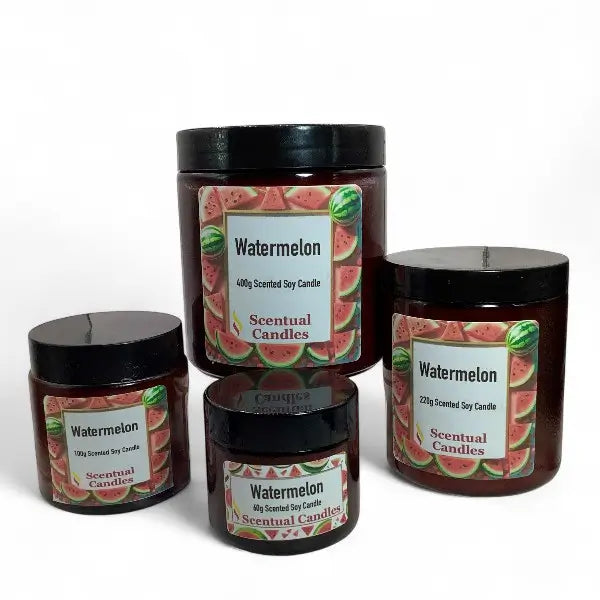 set of four watermelon candles in glass jars