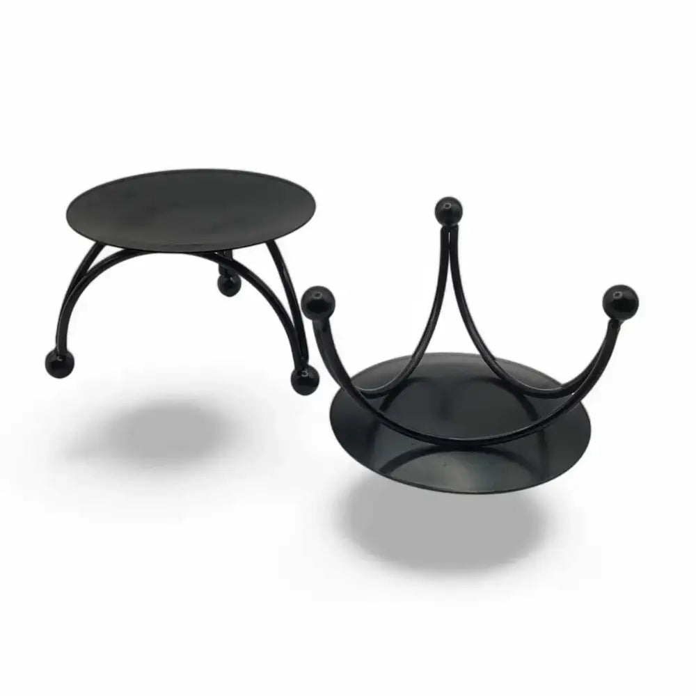 Round Black Metal Candle Stand with three-legged geometric base and matte black finish.