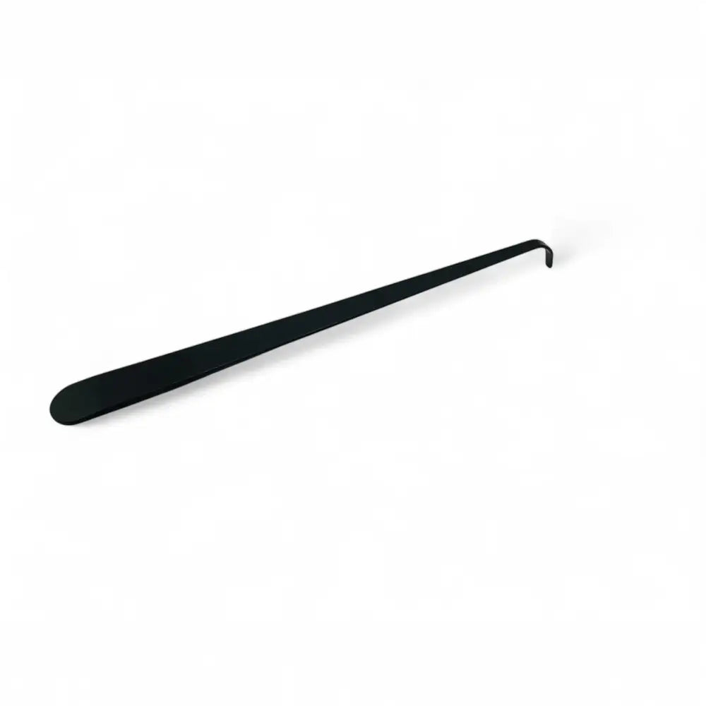 Matte black stainless steel wick dipper from the Candle Care Kit for efficient candle extinguishing.