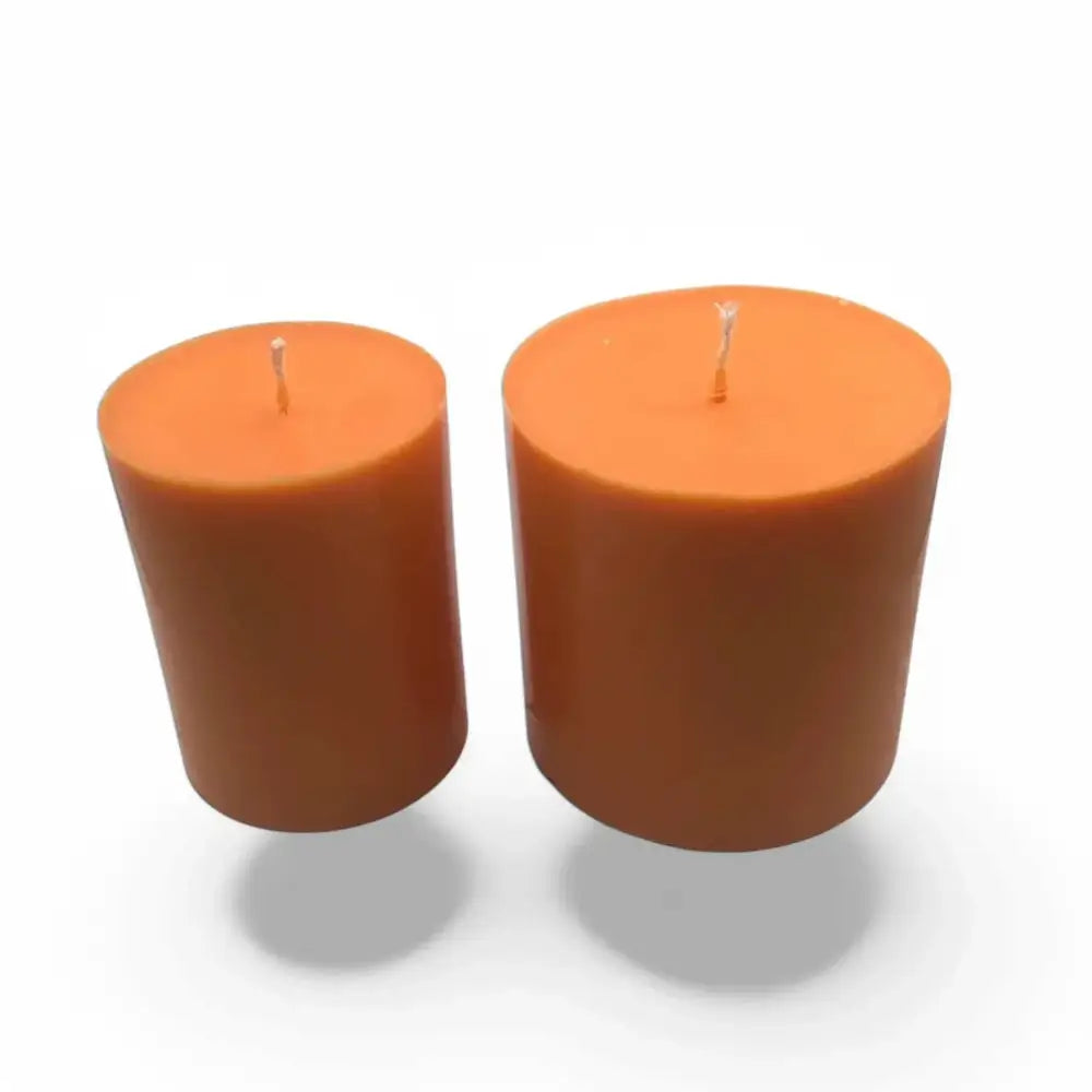 Fruit Scented Soy Candle Set of 2, showing smaller and larger orange candles, perfect for a tranquil atmosphere.