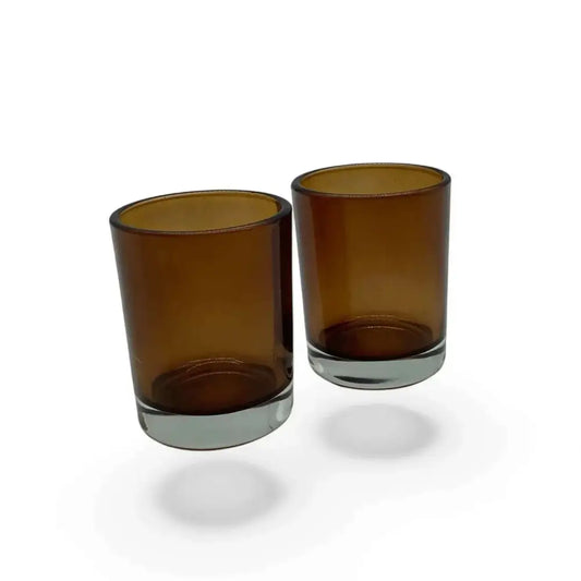 Amber glass votive candle holder, elegant design, 7cm height, cozy ambiance.