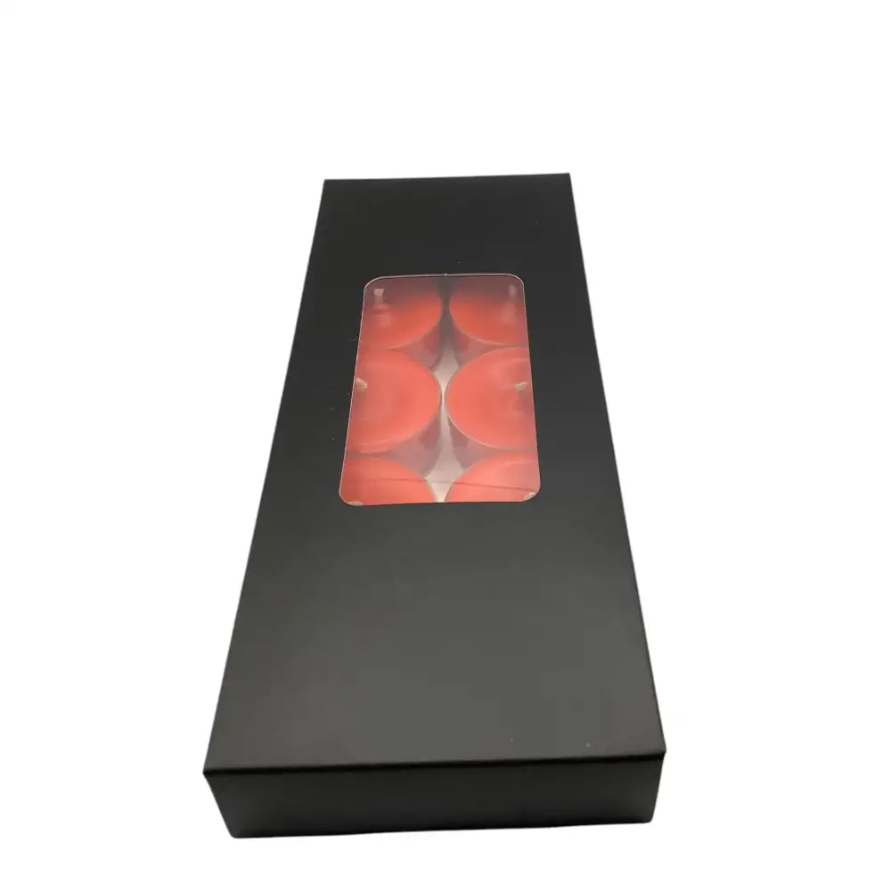 Scented Tealight Candles - 10 Pack Box in black packaging with a clear window displaying candles inside.