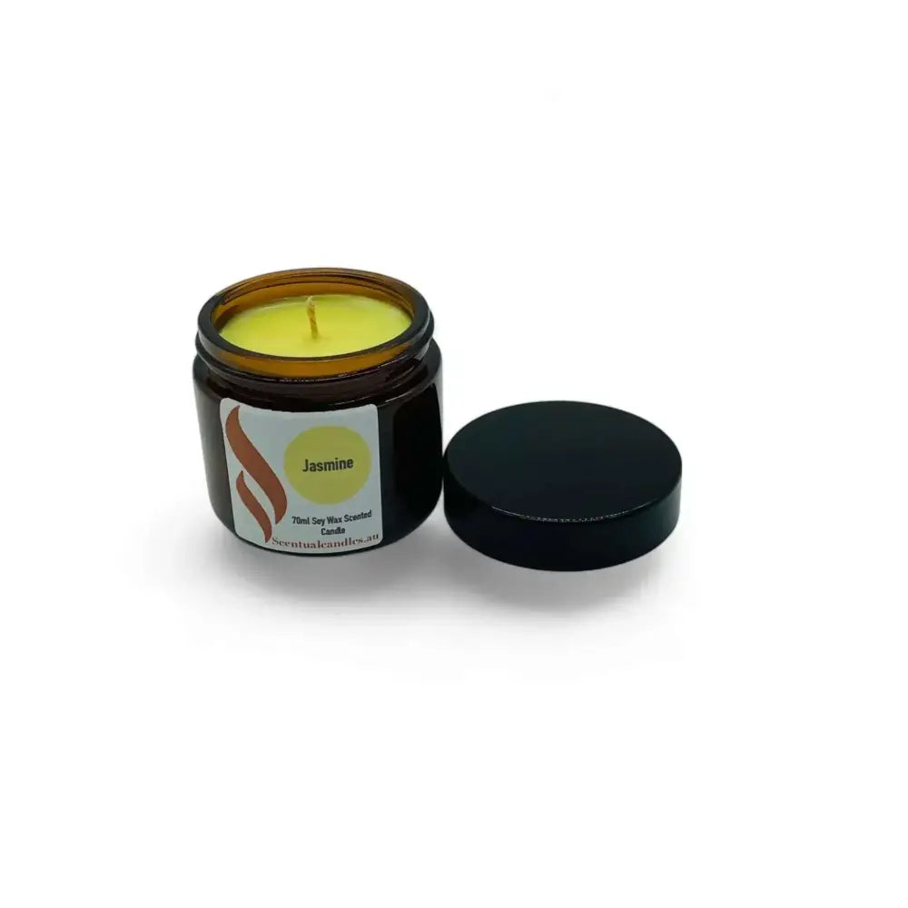 Set of 4 mini soy candles in amber jars featuring floral scents.