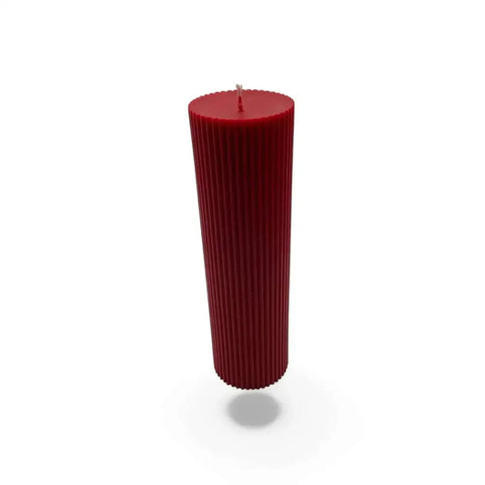 Vanilla and Cinnamon scented soy pillar candle with ribbed column design.