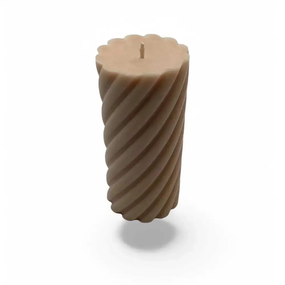 Vanilla scented soy spiral pillar candle with elegant design.