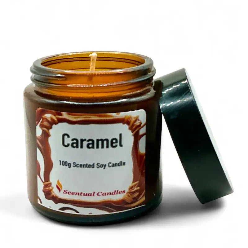 Caramel candle in an amber jar with a label on a white background