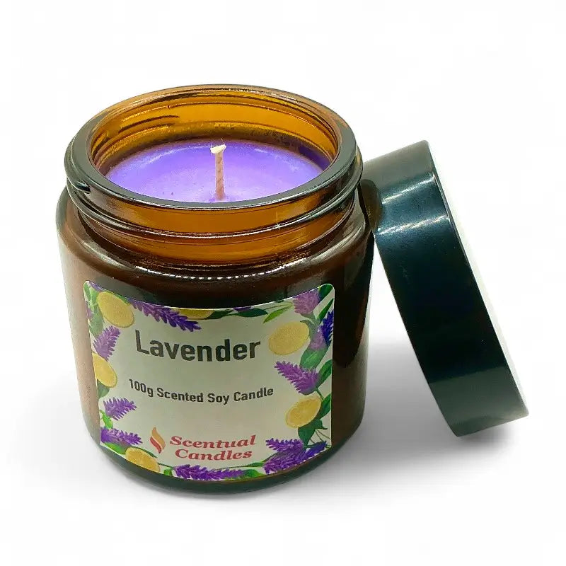 Scentual Candles lavender candle in an amber jar with a green lid.