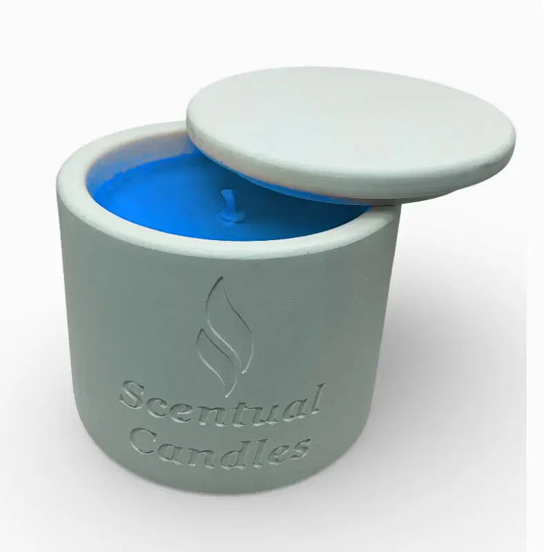 Australian Beach scented candle in a Scentual candles container with blue candle inside on a white background