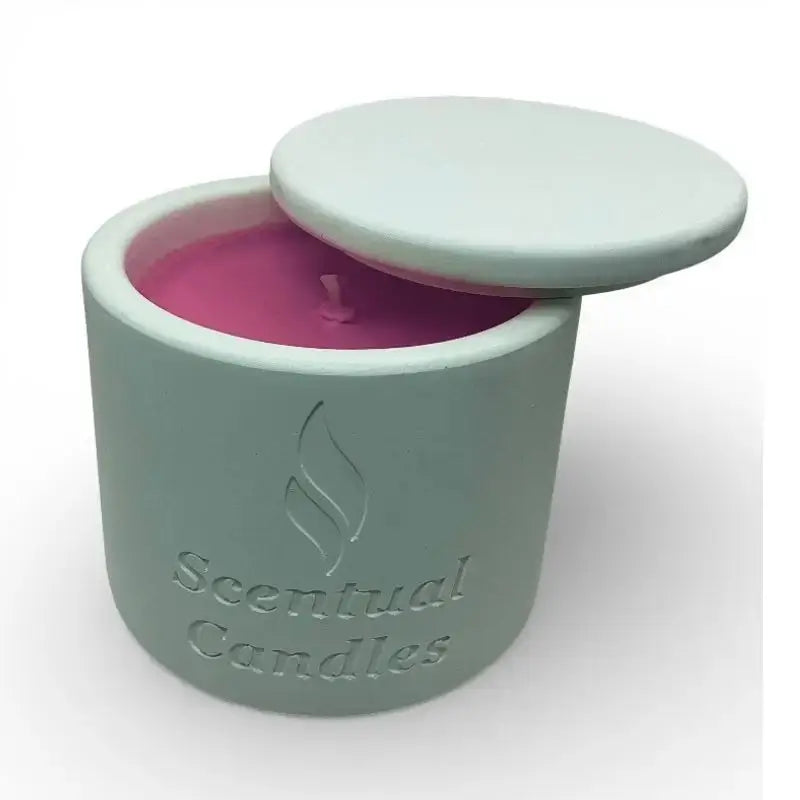 Australian Bush candle in a ceramic jar on white background