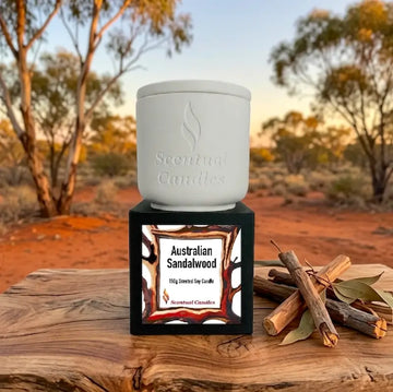 Australian Sandalwood Candle displayed in a white container with decorative packaging and label.