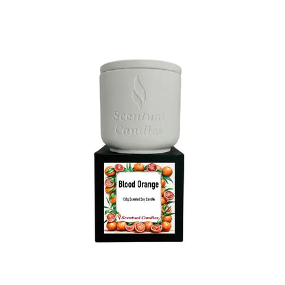 Fresh Scented Candle in white jar labeled Blood Orange, perfect for adding a vibrant aroma to any space.