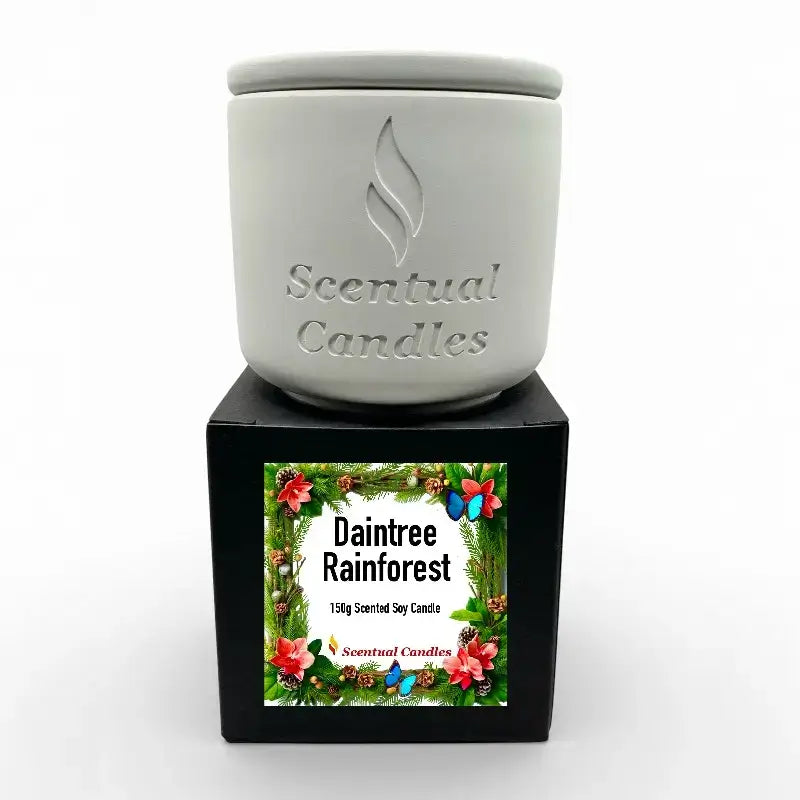 Housewarming Candle Gift Pack showcasing a Daintree Rainforest scented soy candle set on a box with floral design.