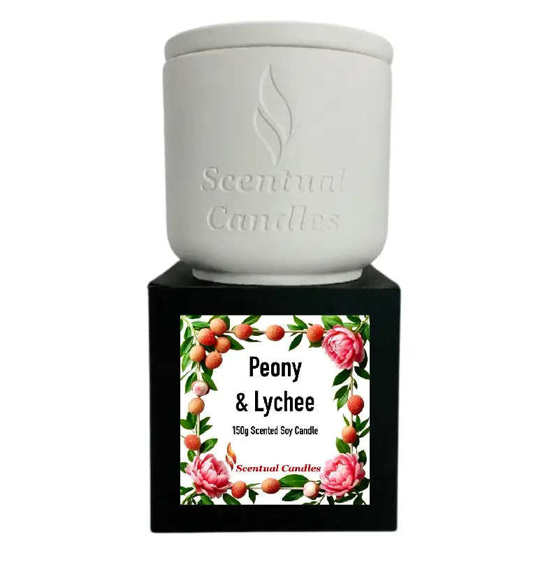 Lychee Scented Candle displayed in a white container with floral peony and lychee label, showcasing its tropical fragrance.