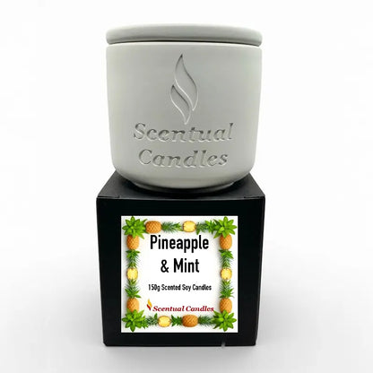 Pineapple & Mint scented candle from Citrus Candles Set, 150g soy wax, displayed in a white jar on a decorative black box.