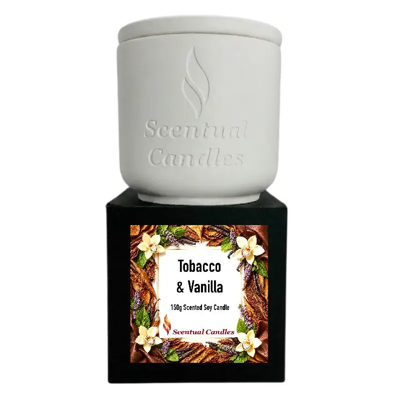 Tobacco Scented Candle displayed in a white ceramic container with a decorative label featuring tobacco and vanilla elements.