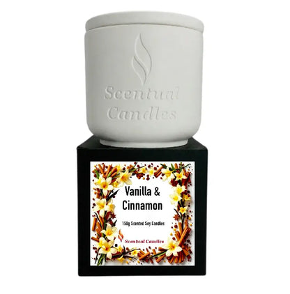 Vanilla and Cinnamon Candle in a stylish container with a floral label, showcasing its warm and spicy scent.