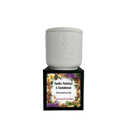 Vanilla Patchouli and Sandalwood Scented Soy Candle in elegant white container with floral label.