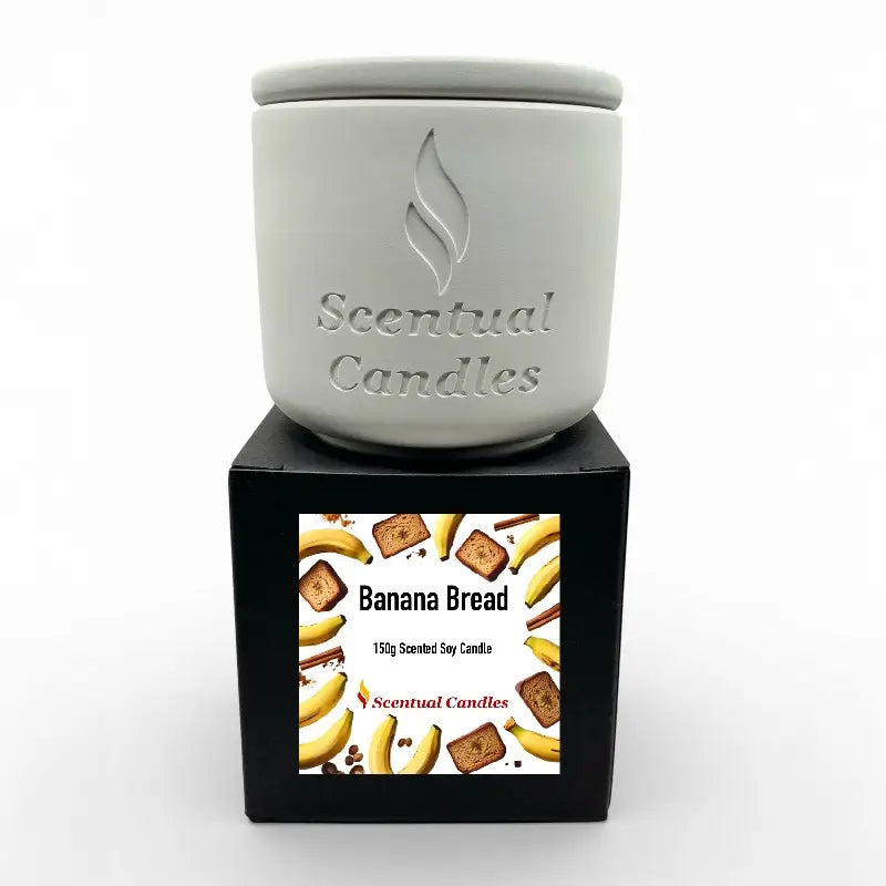 Banana Bread Candle in ceramic jar, scented soy candle with bakery aroma, creating a warm and cozy atmosphere.