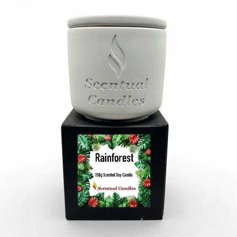 Rainforest Scented Candle in white jar, lush packaging with tropical design, by Scentual Candles, 150g soy candle infused with nature's aroma.