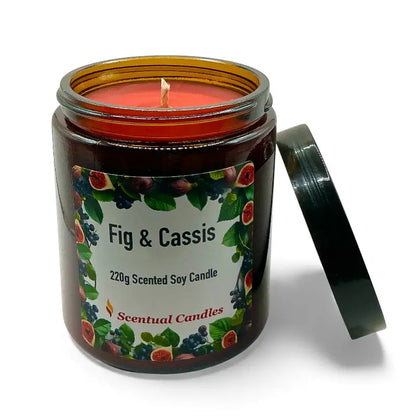 Fig and Cassis scented soy candle in a glass jar with an open lid, showcasing vibrant design and rich, aromatic wax.