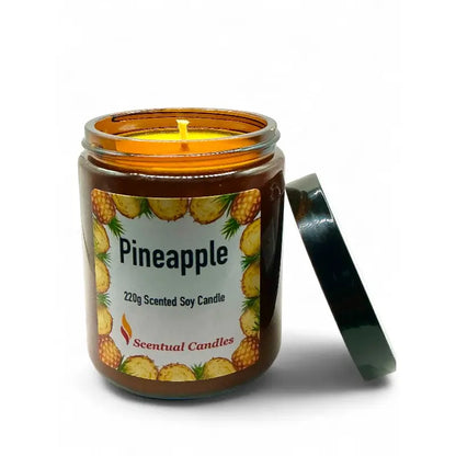Pineapple Scented Tropical Soy Candle in a brown jar with an open lid, evoking a sweet and creamy island fragrance.